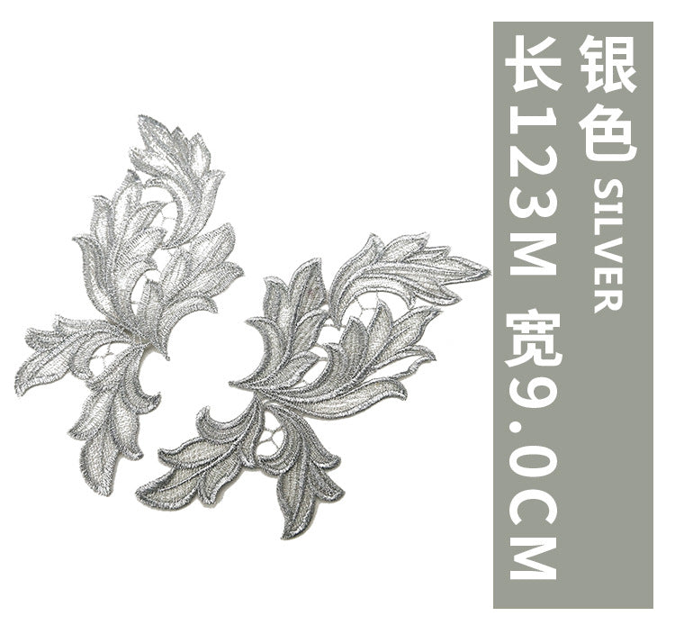 A pair of flower, shoulder, necklace, wing appliqué