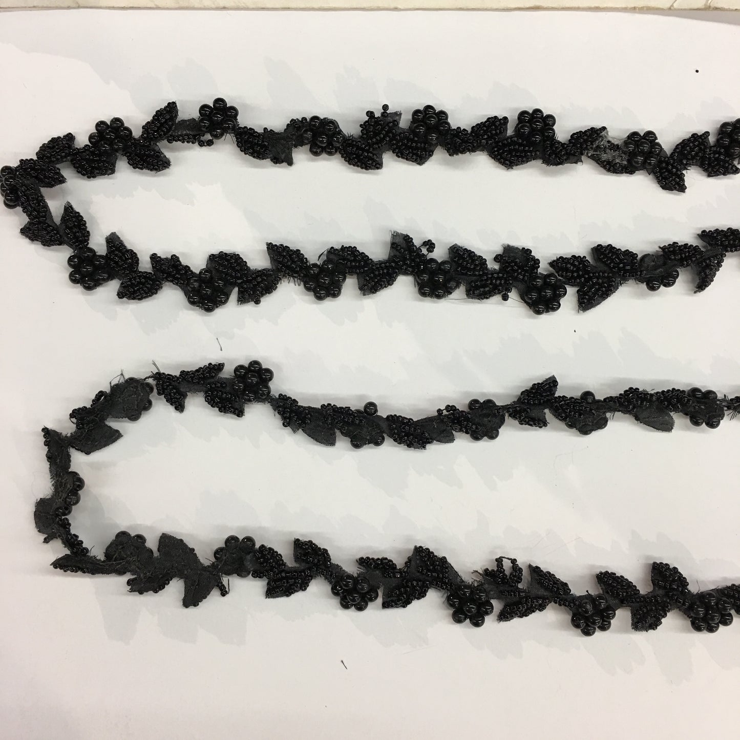 black colored flower beaded trim