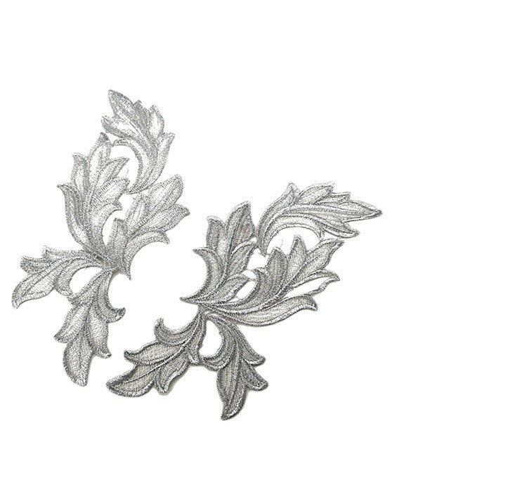 A pair of flower, shoulder, necklace, wing appliqué