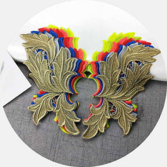 A pair of flower, shoulder, necklace, wing appliqué